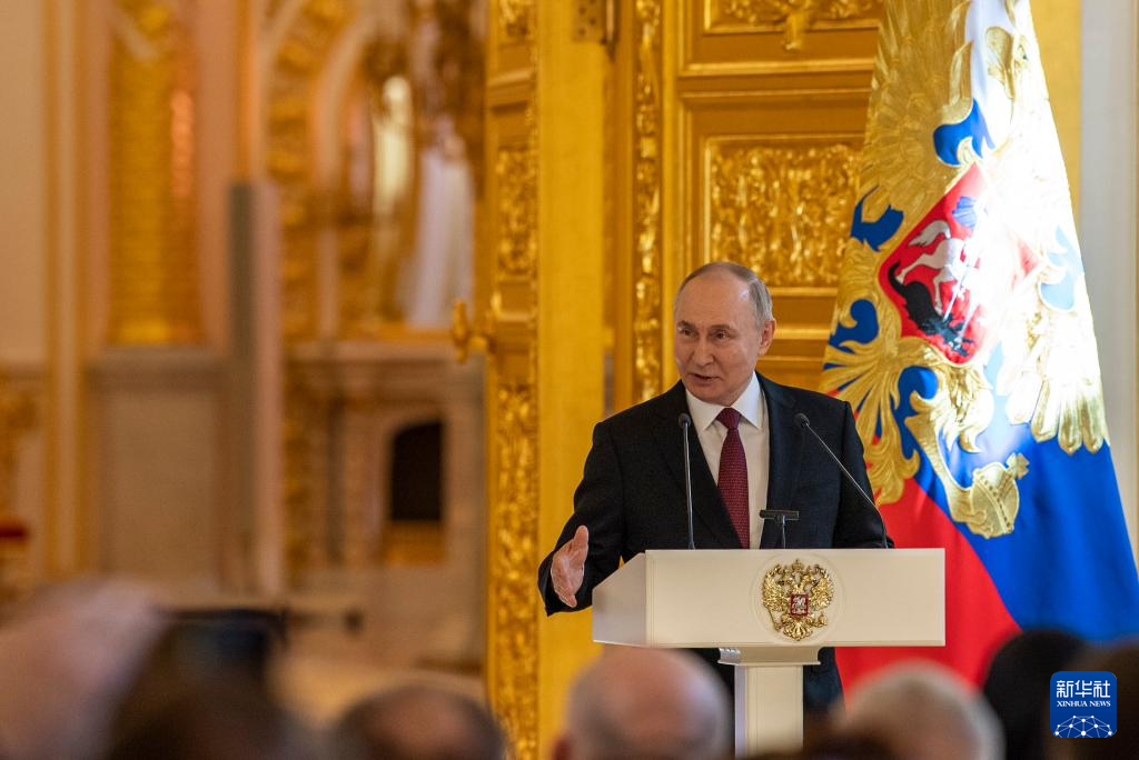 3月20日，俄罗斯总统普京在莫斯科克里姆林宫与其竞选团队代表举行见面会。新华社记者 曹阳 摄