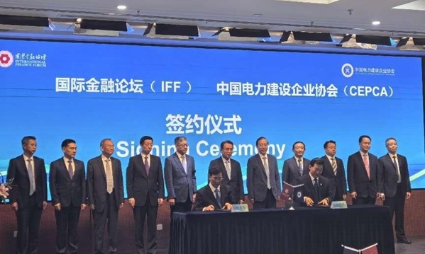 图为活动现场签约仪式。（受访者供图）
